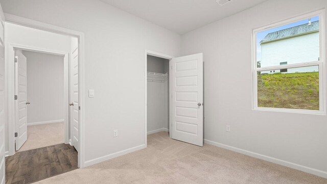 2912 Saltwater Bnd, Beech Island, SC 29842 - unfurnished bedroom with light colored carpet and a closet
