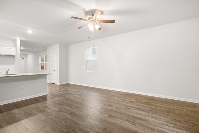 2912 Saltwater Bnd, Beech Island, SC 29842 - unfurnished living room featuring ceiling fan, sink, and dark hardwood / wood-style floors