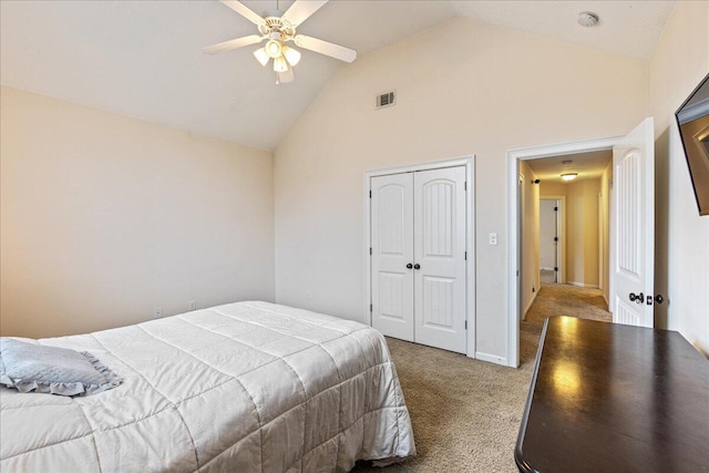 bedroom featuring light carpet, high vaulted ceiling, ceiling fan, and a closet