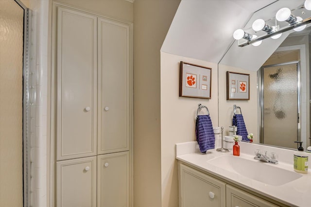 full bathroom featuring an enclosed shower and vanity