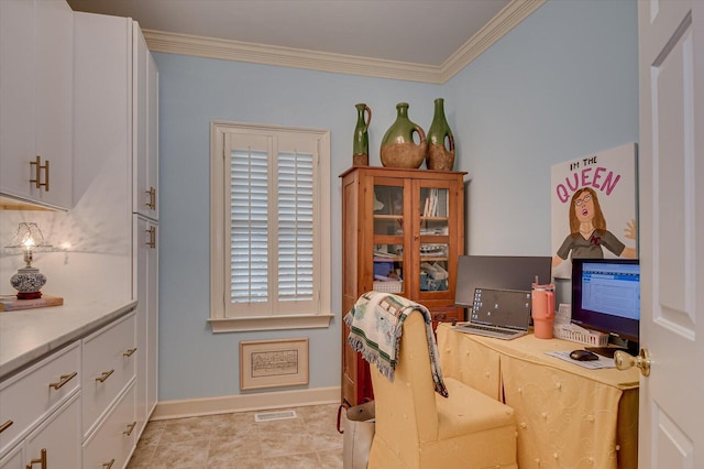 office featuring ornamental molding, visible vents, baseboards, and light tile patterned floors