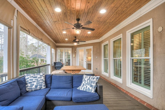 sunroom / solarium featuring wooden ceiling