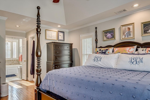 bedroom featuring ensuite bathroom, recessed lighting, visible vents, light wood-style floors, and crown molding