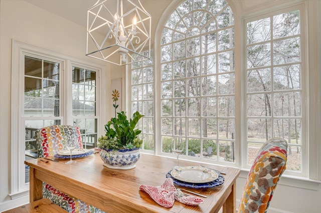 dining area with a chandelier and plenty of natural light