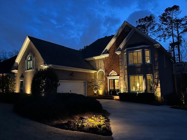 view of front facade featuring a garage and concrete driveway