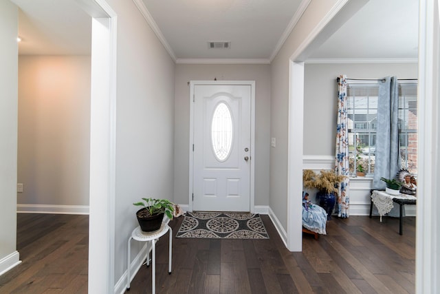 foyer featuring dark hardwood / wood-style floors and ornamental molding