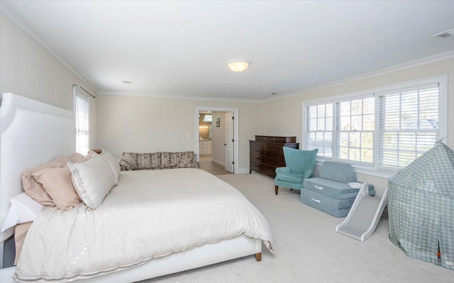 bedroom featuring carpet flooring, crown molding, and visible vents