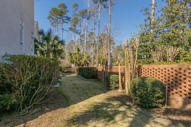 view of yard with a fenced backyard