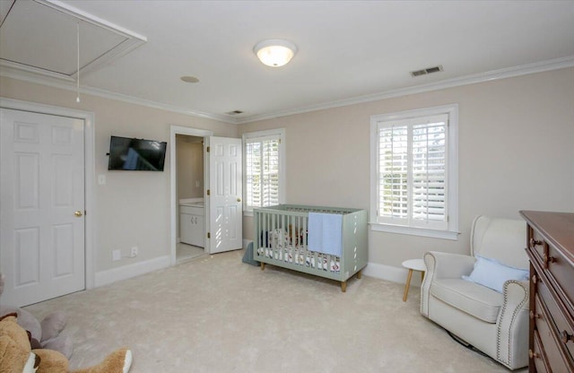 bedroom featuring carpet, crown molding, visible vents, attic access, and baseboards