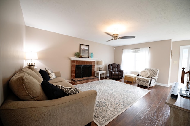 3943 Carson Cutoff, Martinez, GA 30907 - living area featuring dark wood-type flooring, a fireplace, and ceiling fan
