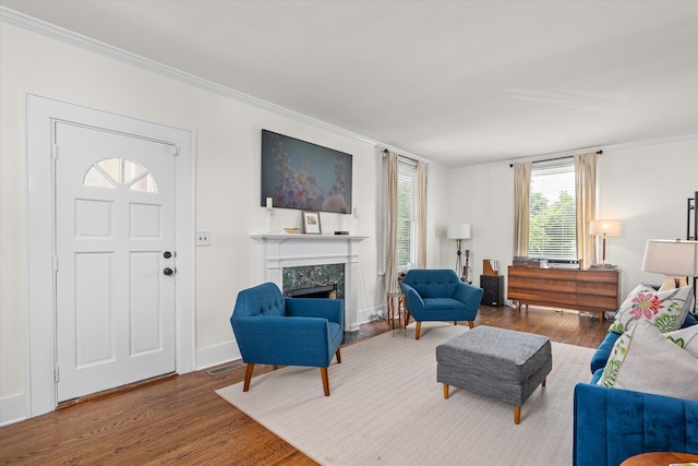 2442 Mcdowell St, Augusta, GA 30904 - living room featuring baseboards, ornamental molding, wood finished floors, and a premium fireplace