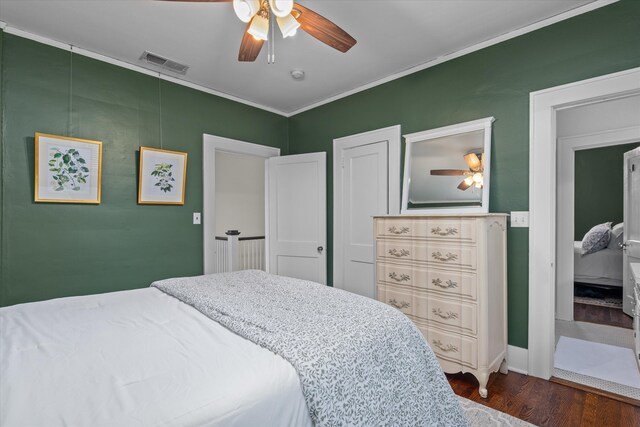 2442 Mcdowell St, Augusta, GA 30904 - bedroom with crown molding, a ceiling fan, visible vents, and wood finished floors