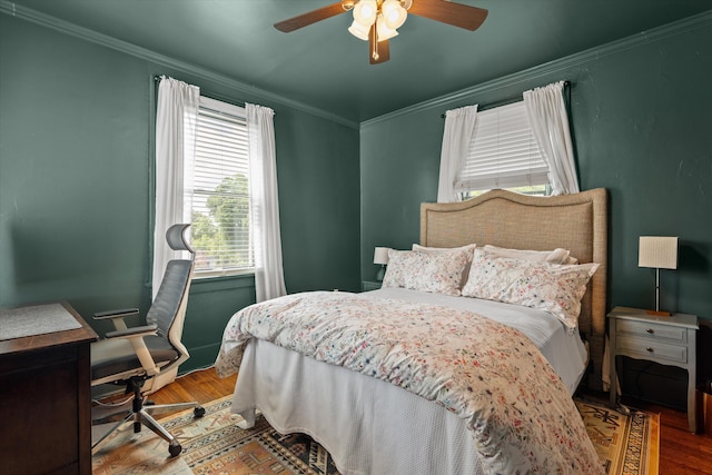 2442 Mcdowell St, Augusta, GA 30904 - bedroom featuring a ceiling fan, ornamental molding, and wood finished floors