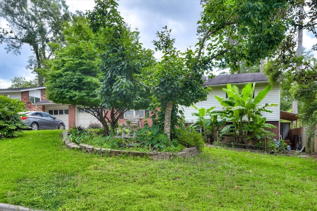 3364 Wedgewood Dr, Augusta, GA 30909 - view of green lawn with a garage