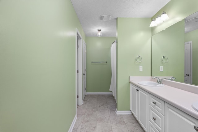 4046 Stone Pass Dr, Graniteville, SC 29829 - full bathroom featuring double vanity and a textured ceiling