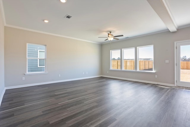 unfurnished room with crown molding, dark wood-style flooring, and baseboards