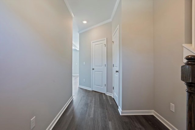 hallway with crown molding, dark wood-style flooring, recessed lighting, and baseboards