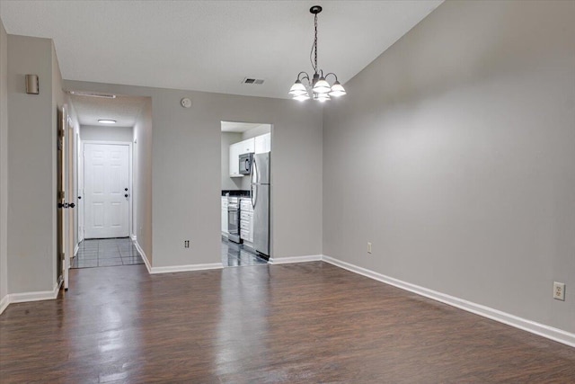 4005 Calypso Dr, Augusta, GA 30909 - unfurnished room with dark wood-type flooring and a chandelier