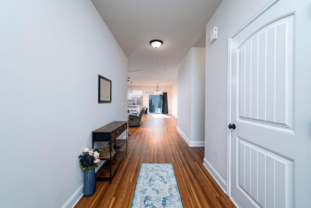 hall featuring dark wood-type flooring