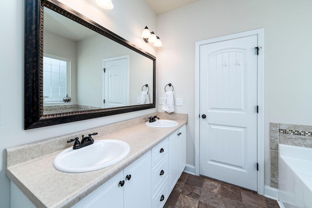 bathroom featuring a bathtub and vanity