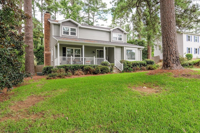 view of property featuring a front yard