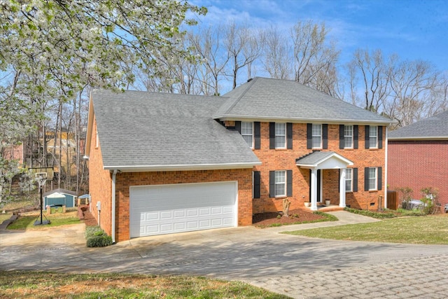 view of front of house with brick siding, a front lawn, concrete driveway, roof with shingles, and an attached garage