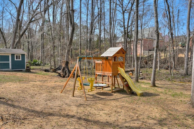 view of jungle gym with an outbuilding and a shed