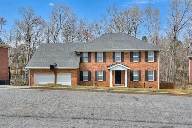 view of front of home with brick siding, fence, roof with shingles, central AC unit, and an attached garage