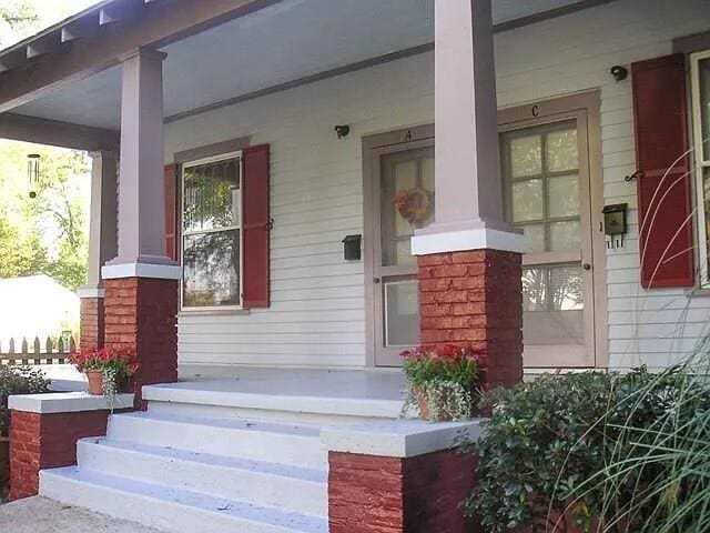 doorway to property featuring covered porch