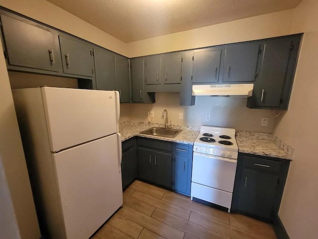 kitchen featuring gray cabinets, sink, and white appliances