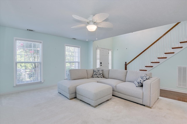 109 Mitchell Dr, North Augusta, SC 29860 - carpeted living room with ceiling fan and stairway