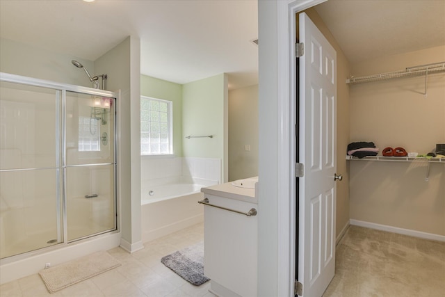 109 Mitchell Dr, North Augusta, SC 29860 - full bath featuring a shower stall, a bath, a spacious closet, and vanity