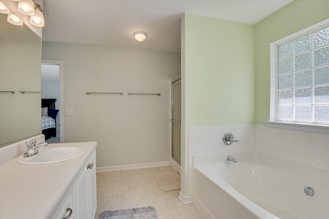 109 Mitchell Dr, North Augusta, SC 29860 - ensuite bathroom with a garden tub, vanity, and a stall shower