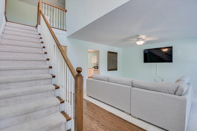 109 Mitchell Dr, North Augusta, SC 29860 - living area with a ceiling fan, wood finished floors, and stairway