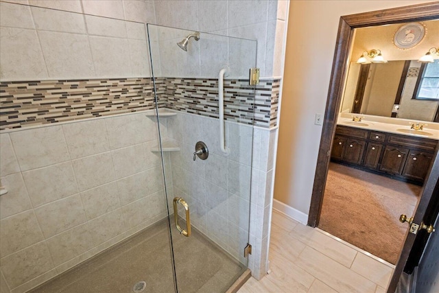 5114 Fairington Dr, Evans, GA 30809 - bathroom with double vanity, tile patterned floors, a stall shower, and a sink