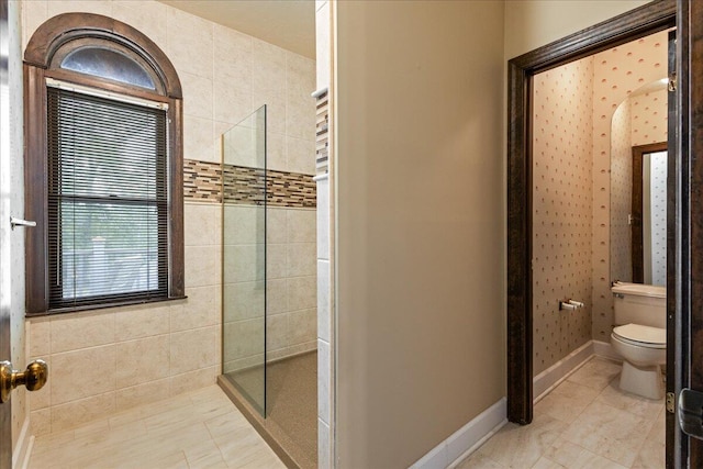 5114 Fairington Dr, Evans, GA 30809 - bathroom featuring walk in shower, toilet, and baseboards