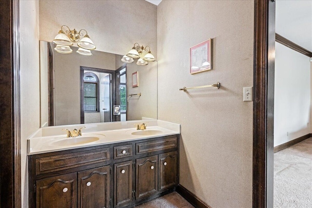 5114 Fairington Dr, Evans, GA 30809 - bathroom with double vanity, baseboards, and a sink