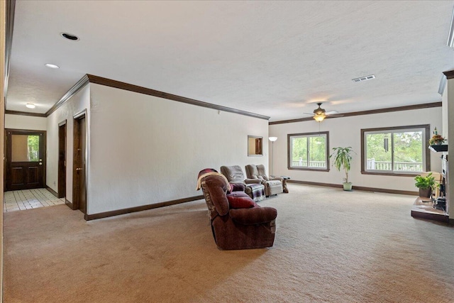 5114 Fairington Dr, Evans, GA 30809 - carpeted living room with ornamental molding, visible vents, and baseboards