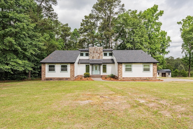 craftsman-style home with a front lawn