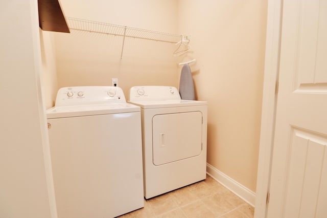 5553 Connor Dr, Evans, GA 30809 - washroom with independent washer and dryer and light tile patterned floors
