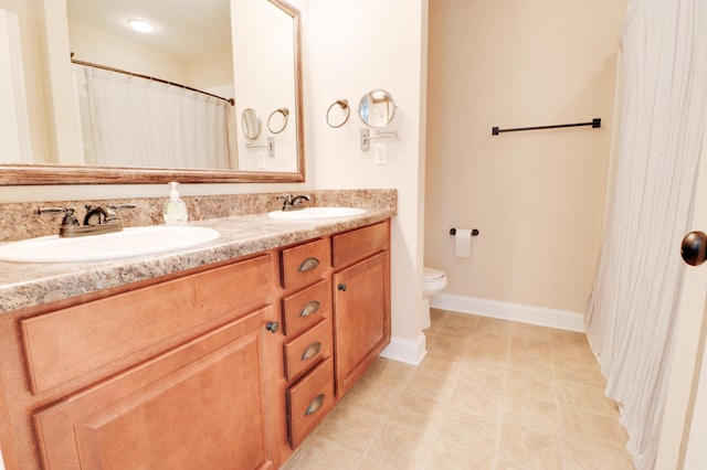 5553 Connor Dr, Evans, GA 30809 - bathroom featuring double vanity and tile patterned floors