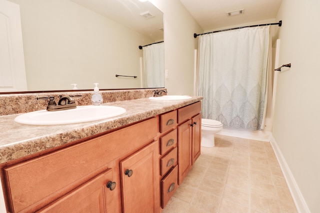 5553 Connor Dr, Evans, GA 30809 - bathroom with double vanity, a shower with shower curtain, and tile patterned floors