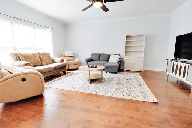 5553 Connor Dr, Evans, GA 30809 - living room with crown molding, a ceiling fan, and wood finished floors
