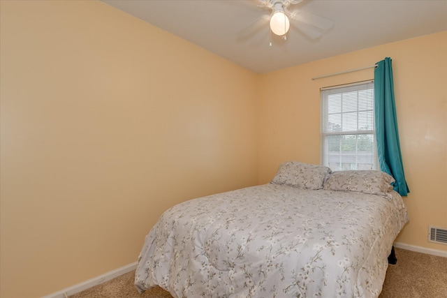 4056 Burning Tree Ln, Augusta, GA 30906 - carpeted bedroom with baseboards and ceiling fan