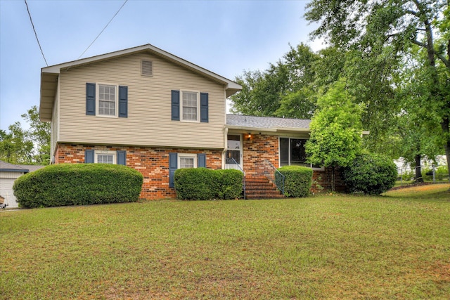 4056 Burning Tree Ln, Augusta, GA 30906 - tri-level home featuring brick siding and a front lawn