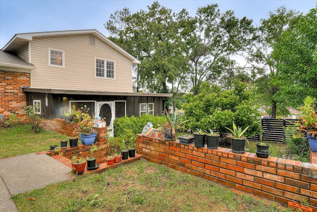 4056 Burning Tree Ln, Augusta, GA 30906 - view of front of property with a front yard and board and batten siding