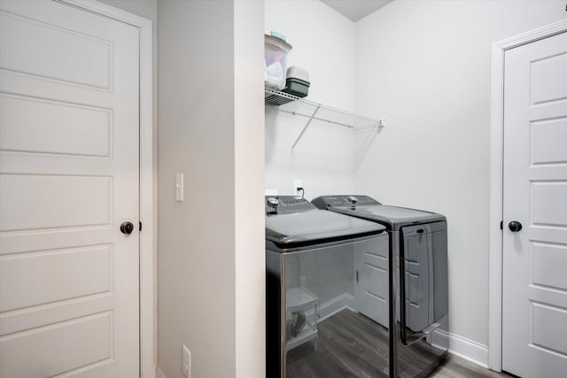 laundry room featuring hardwood / wood-style floors and independent washer and dryer