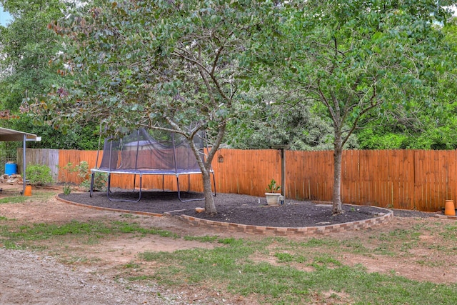 120 Stone St, Harlem, GA 30814 - fenced backyard with a trampoline