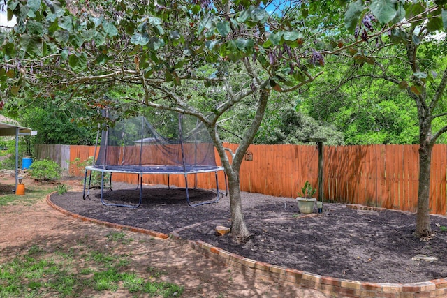 120 Stone St, Harlem, GA 30814 - fenced backyard featuring a trampoline