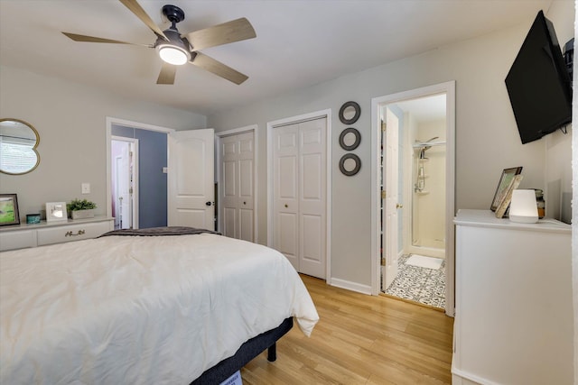 120 Stone St, Harlem, GA 30814 - bedroom with multiple closets, light wood-style floors, connected bathroom, and ceiling fan